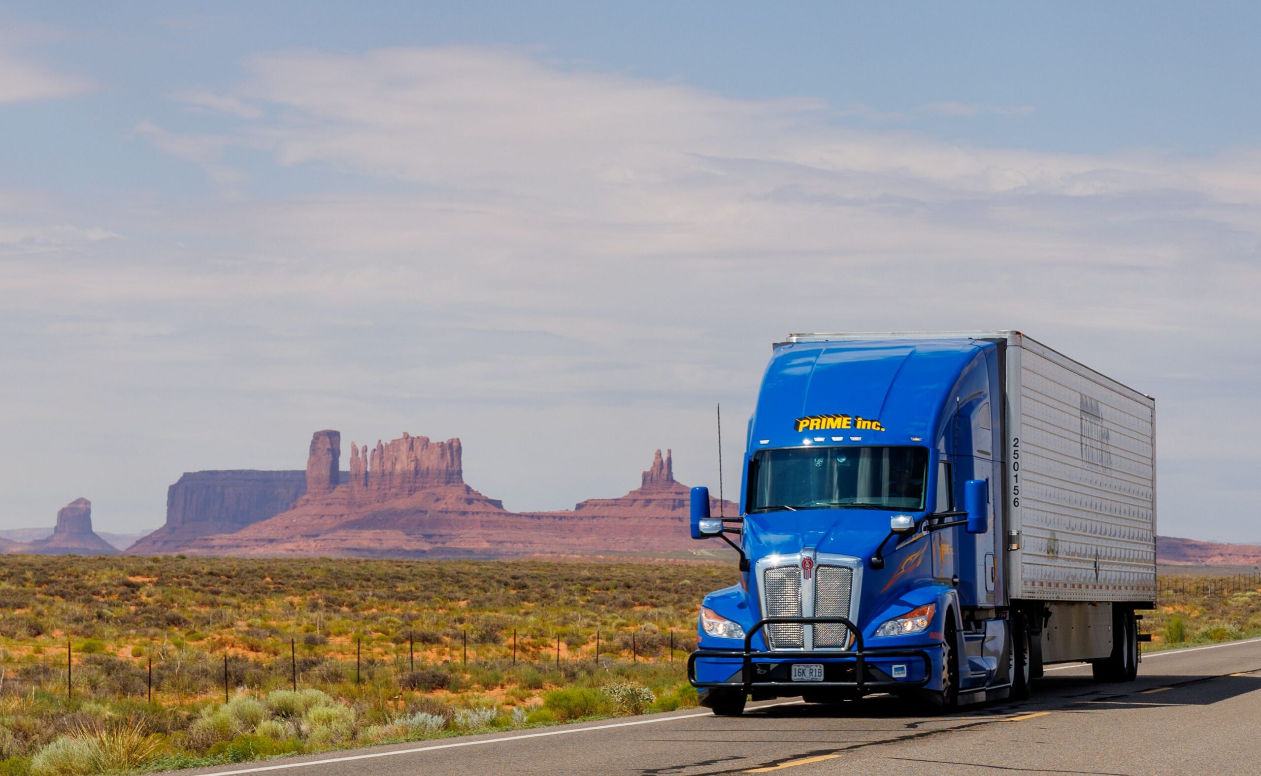 Freight truck driving on desert highway